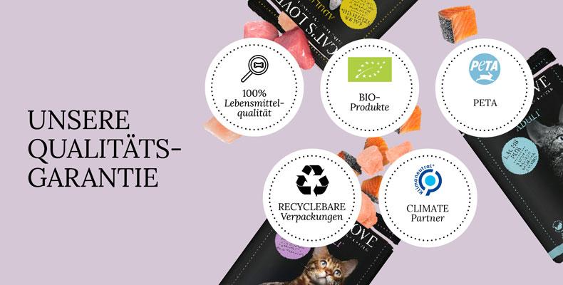 Cat’s Love Abbinder Bannergrafik mit Cat’s Love Qualitätsgarantien wie Bio‑Produkt, PETA und recycelbare Verpackung.