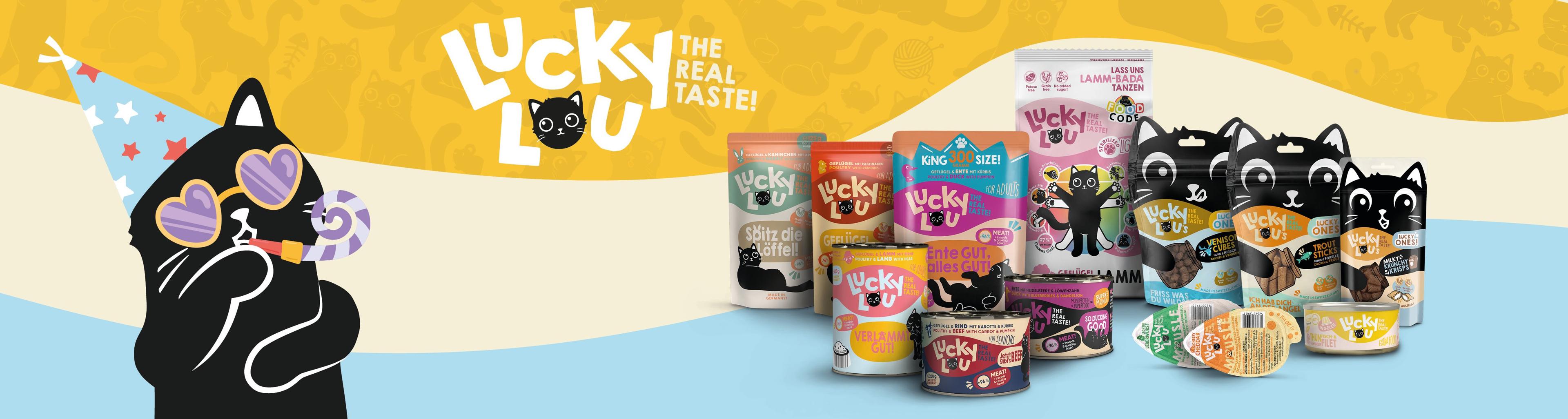 Lucky Lou Topbanner Lucky‑Lou‑Produktsortiment mit Trockenfutter, Nassfutter und Snacks vor farbigem Hintergrund.